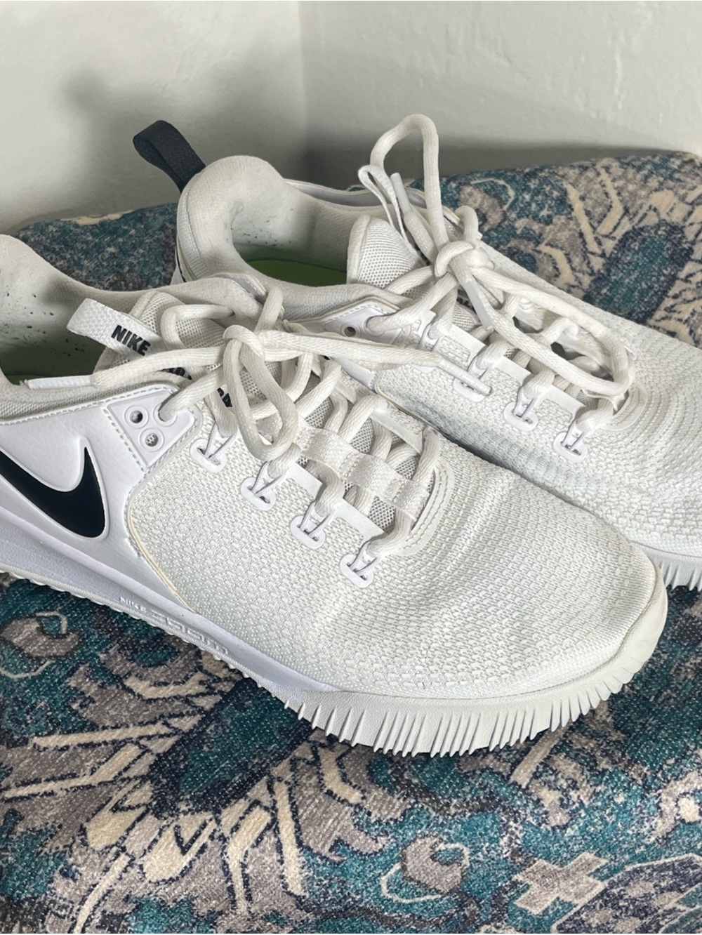 Nike White Athletic Sneakers with Black Swoosh and Dark Heel Tab. Volleyball.